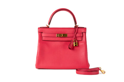 Indulge in luxury with this authentic Hermès 28 cm Rose Pink Clemence Kelly