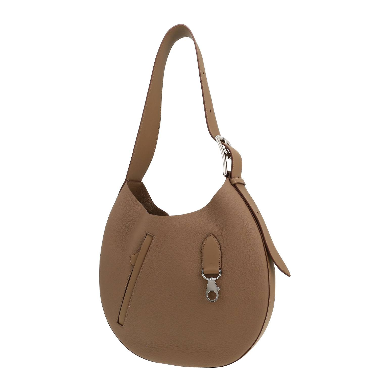 The Return of Elegance: The Arçon Bag by Hermès