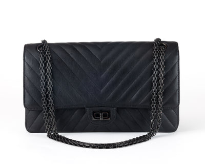 Look no further than this authentic Chanel So Black Chevron Medium Classic