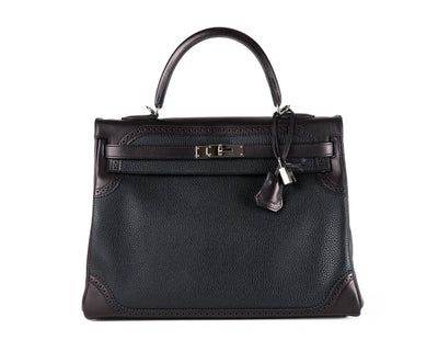 Make a statement with this one-of-a-kind Hermès 35cm Limited Edition Bleu Indigo Box Calf & Black Togo Ghillies bag