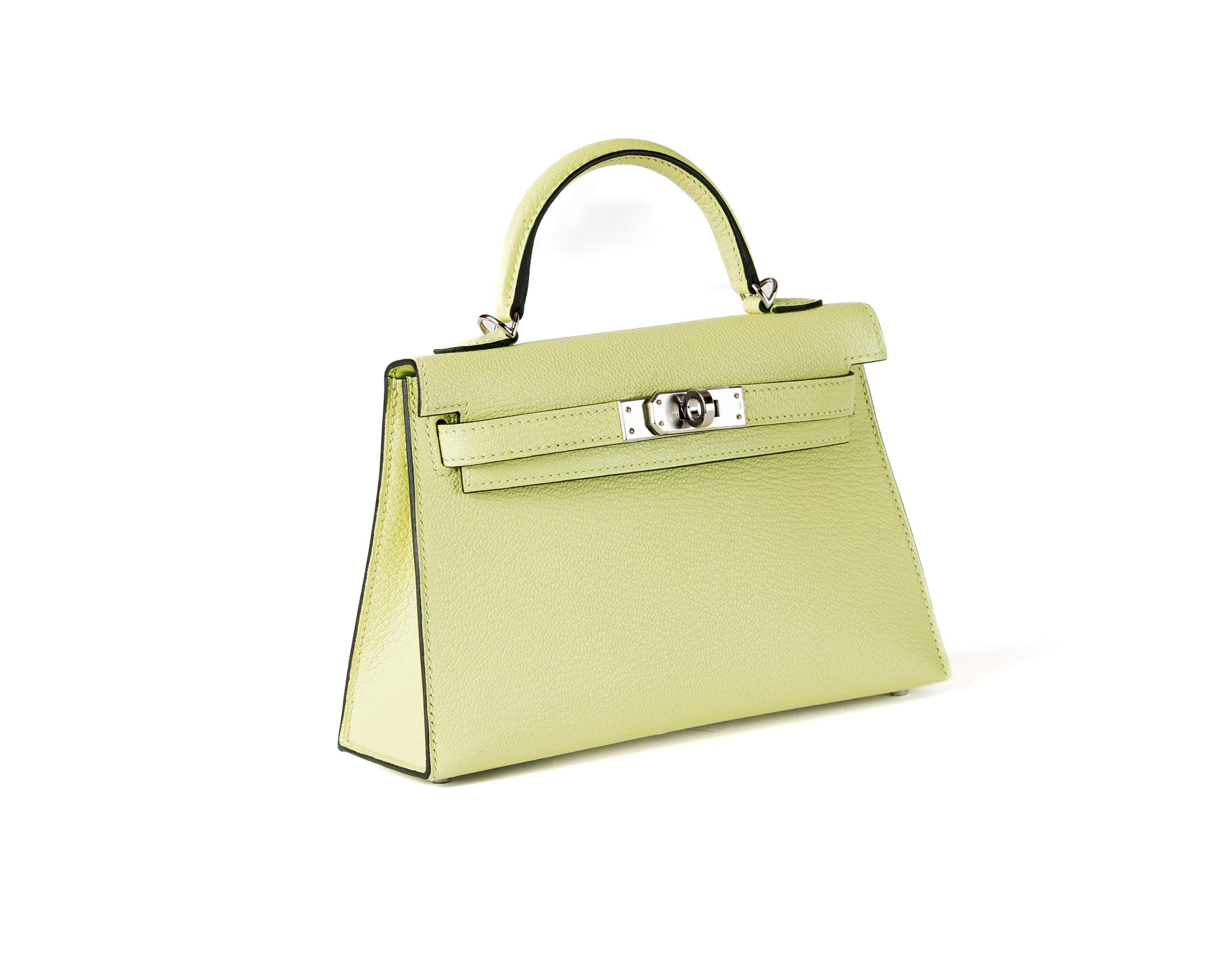 Introducing the Hermès 20cm Light Mint Green Chevre Mini Kelly, finished with sleek palladium hardware