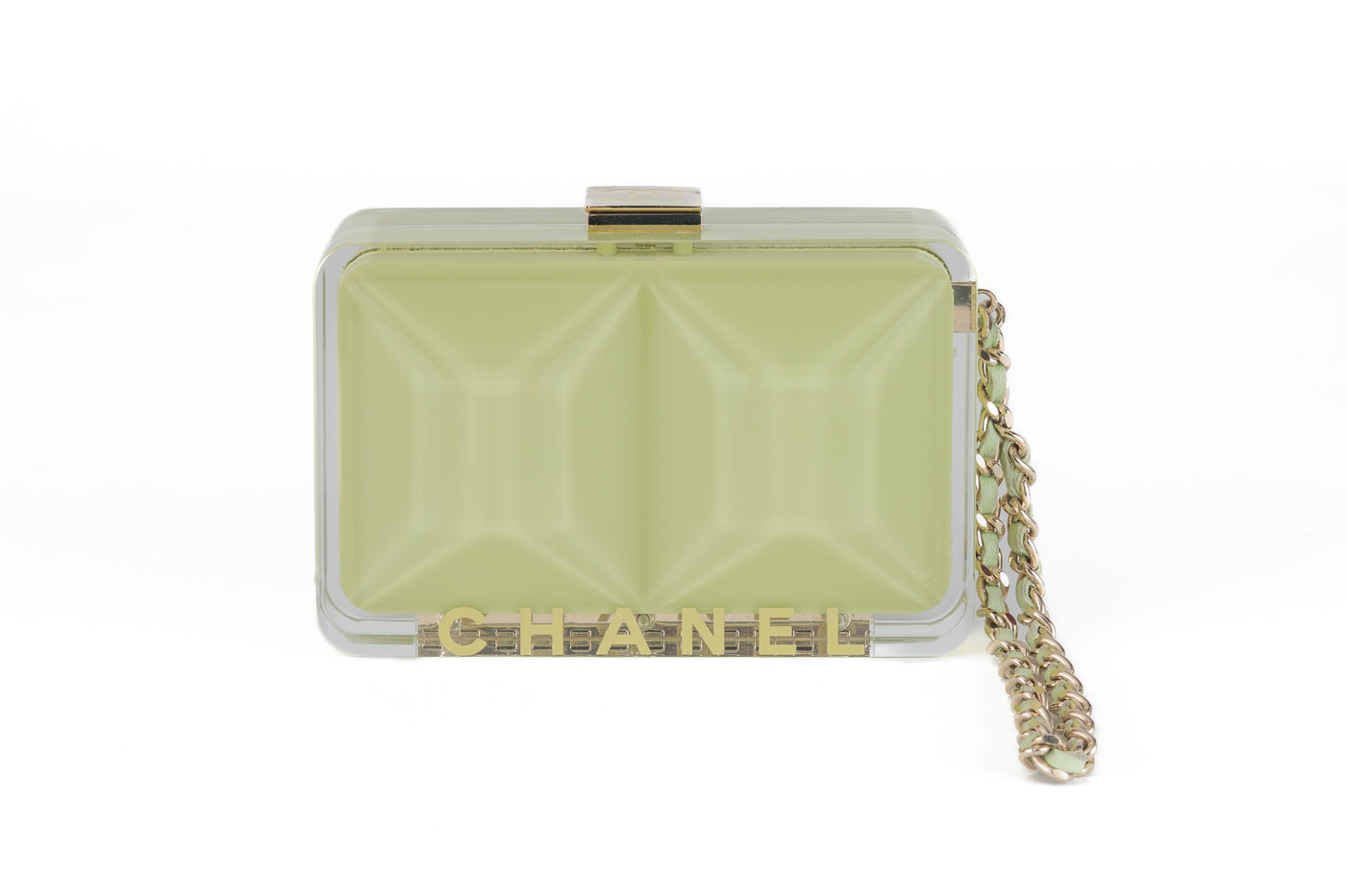 Looking for a vintage Chanel clutch to add to your collection? Look no further than this authentic Mint Green Resin Mini Clutch from the 1984 Runway collection