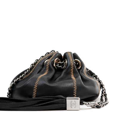 Chanel Black Leather Reversible Pouchette with Tassel - Only Authentics